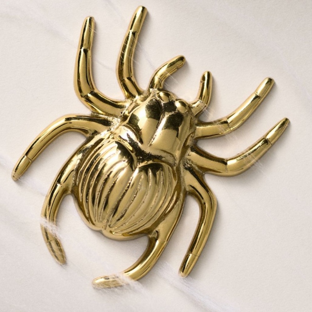 Anthropologie X Catherine Martin midnight creatures brass bottle opener
